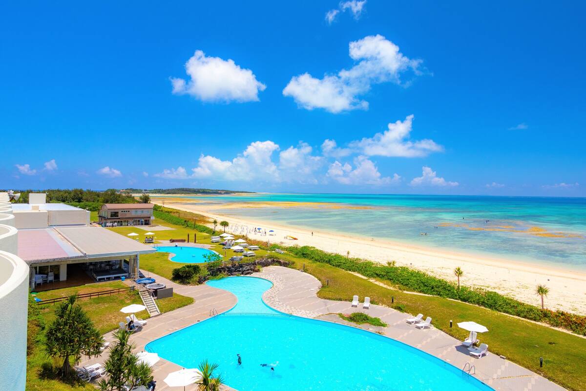 outdoor pool, pool umbrellas, pool loungers