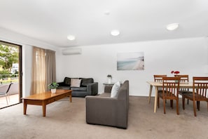 3 Bedroom Apartment | Living area | 42-cm flat-screen TV with digital channels, TV