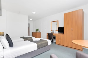 Standard Twin Single Room | Living area | 42-cm flat-screen TV with digital channels, TV