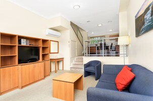 2 Bedroom Spa Apartment | Living area | 42-cm flat-screen TV with digital channels, TV