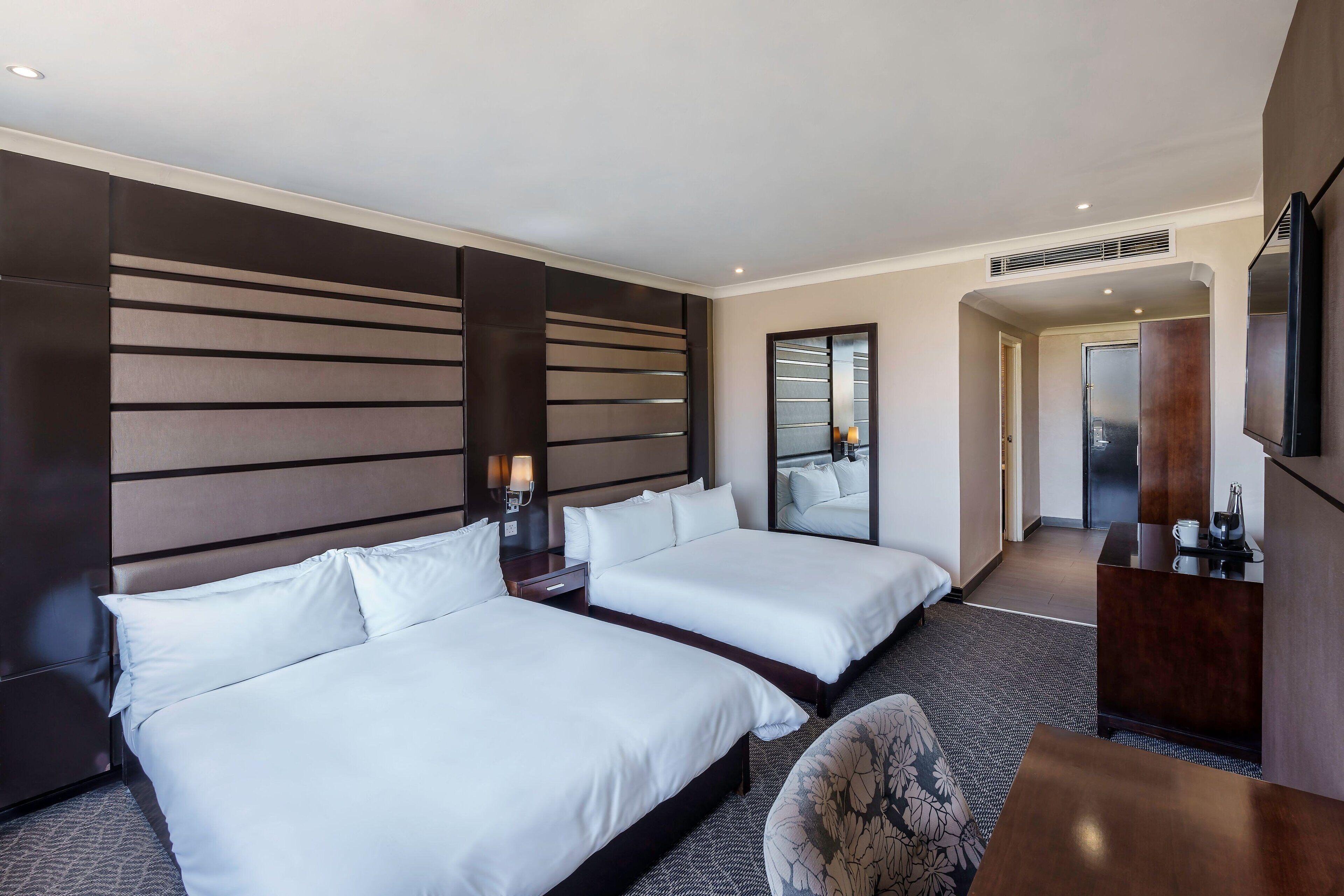 room, 2 queen beds | minibar, in-room safe, desk, iron/ironing board