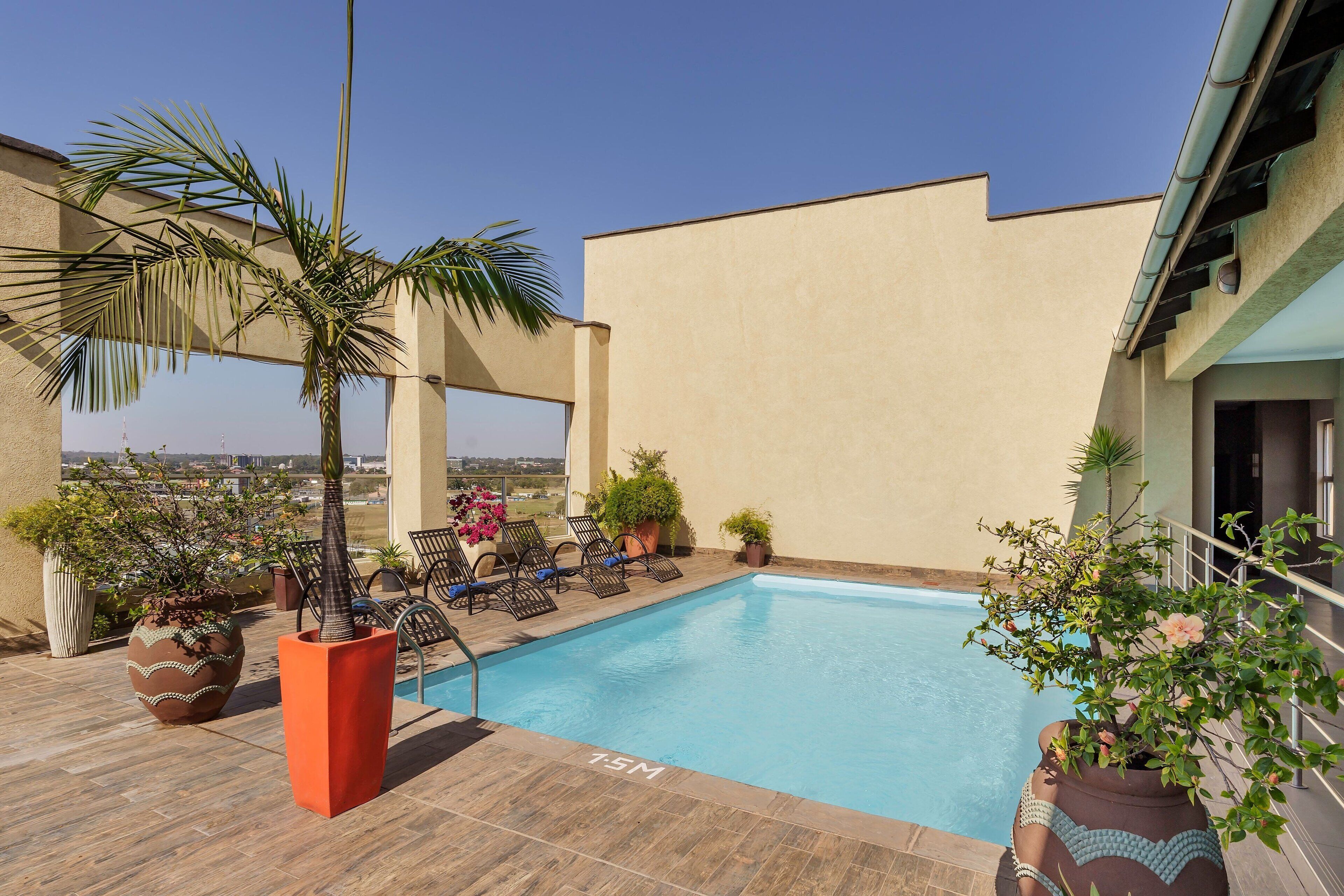 outdoor pool, pool loungers