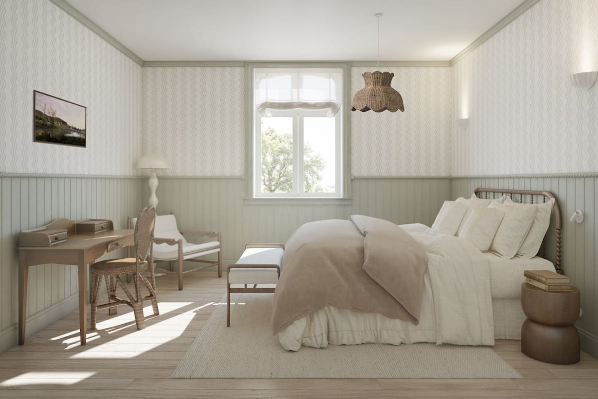 A bedroom with a bed, bedside table, chair, lamp, and a window.