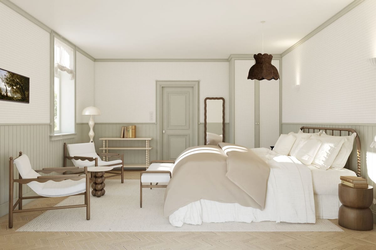A bedroom with a bed, bedside tables, a chair, a mirror, and a hanging light fixture.