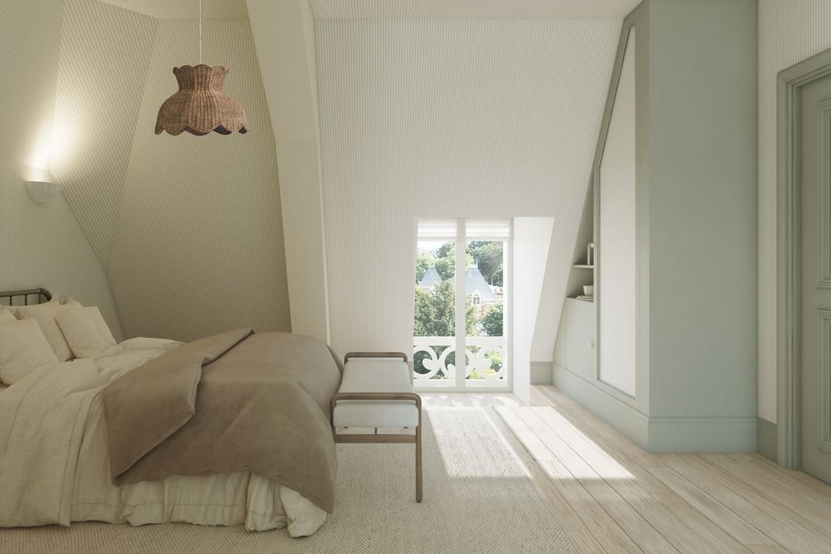 A bedroom with a bed, a bedside table, a hanging light fixture, and a view of the outdoors.