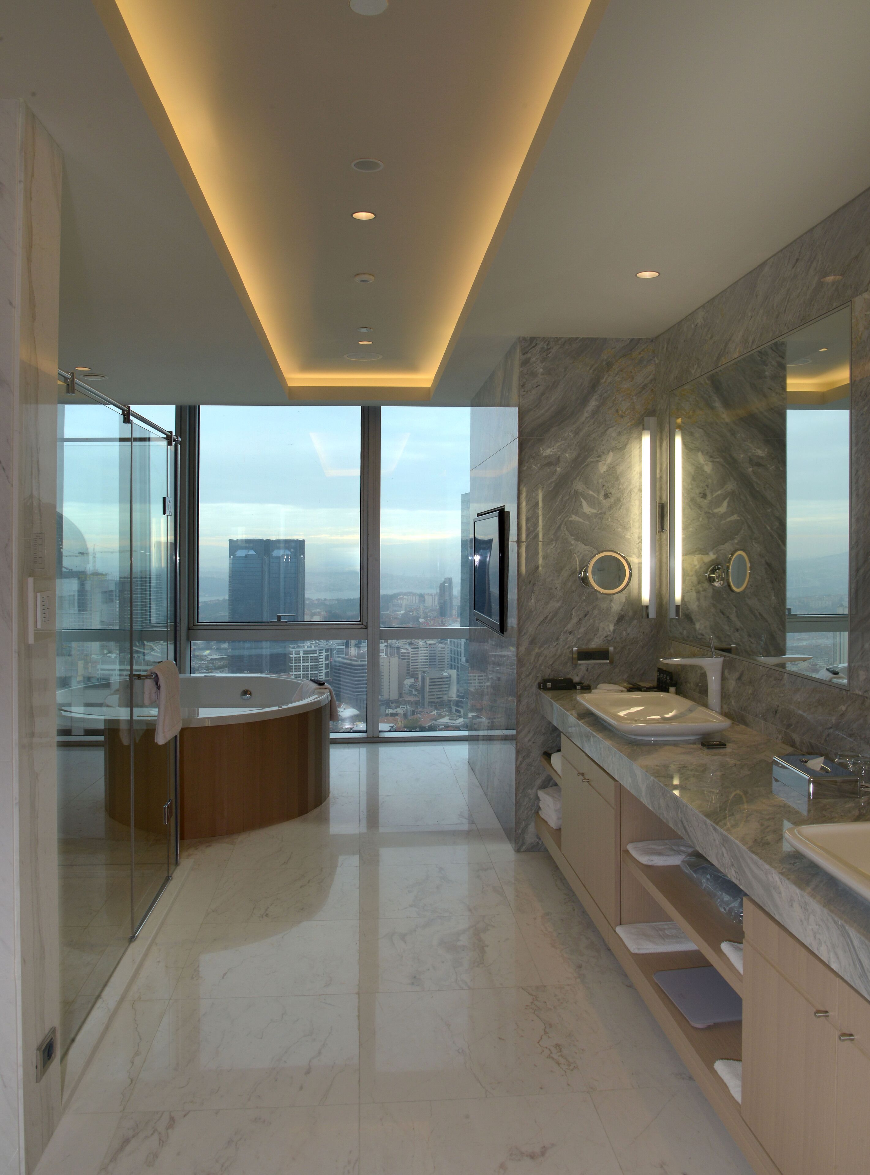 presidential suite | bathroom | rainfall showerhead, eco-friendly toiletries, hair dryer, bathrobes