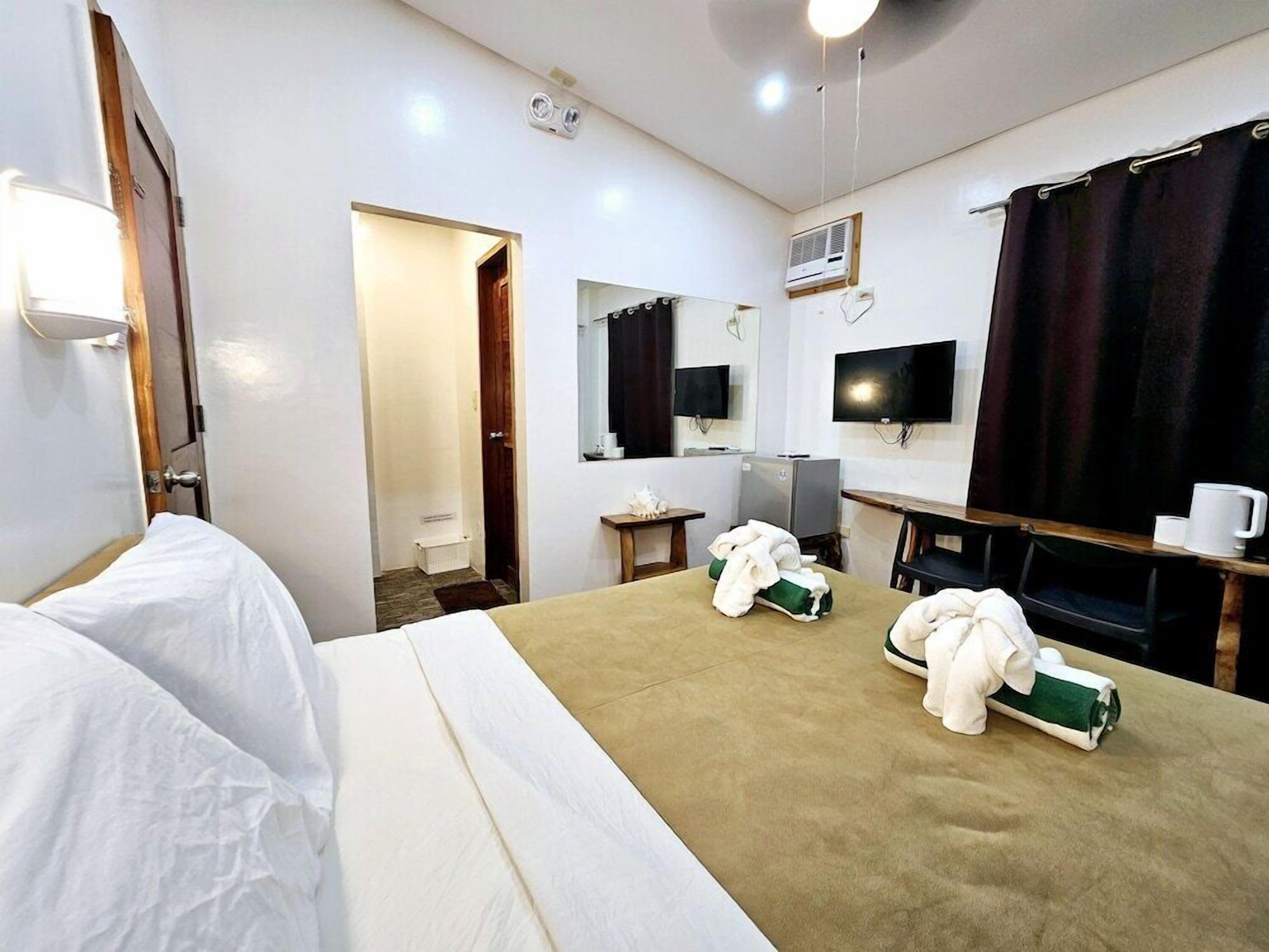 1 slaapkamer, een minibar, een kluis op de kamer, een bureau