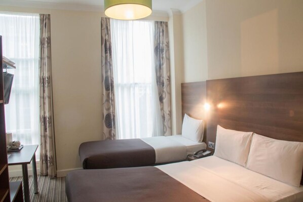 Desk, iron/ironing board, free wired Internet, bed sheets