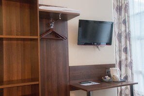 Desk, iron/ironing board, free wired Internet, bed sheets