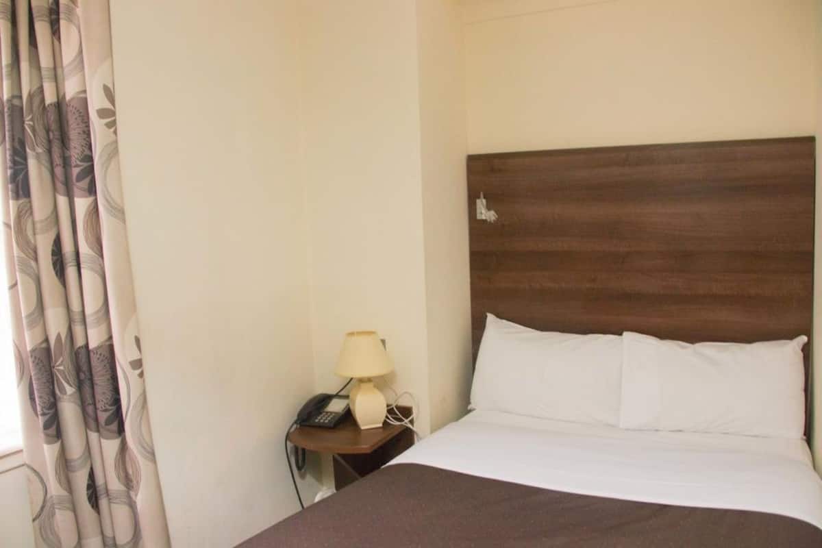 Desk, iron/ironing board, free wired Internet, bed sheets