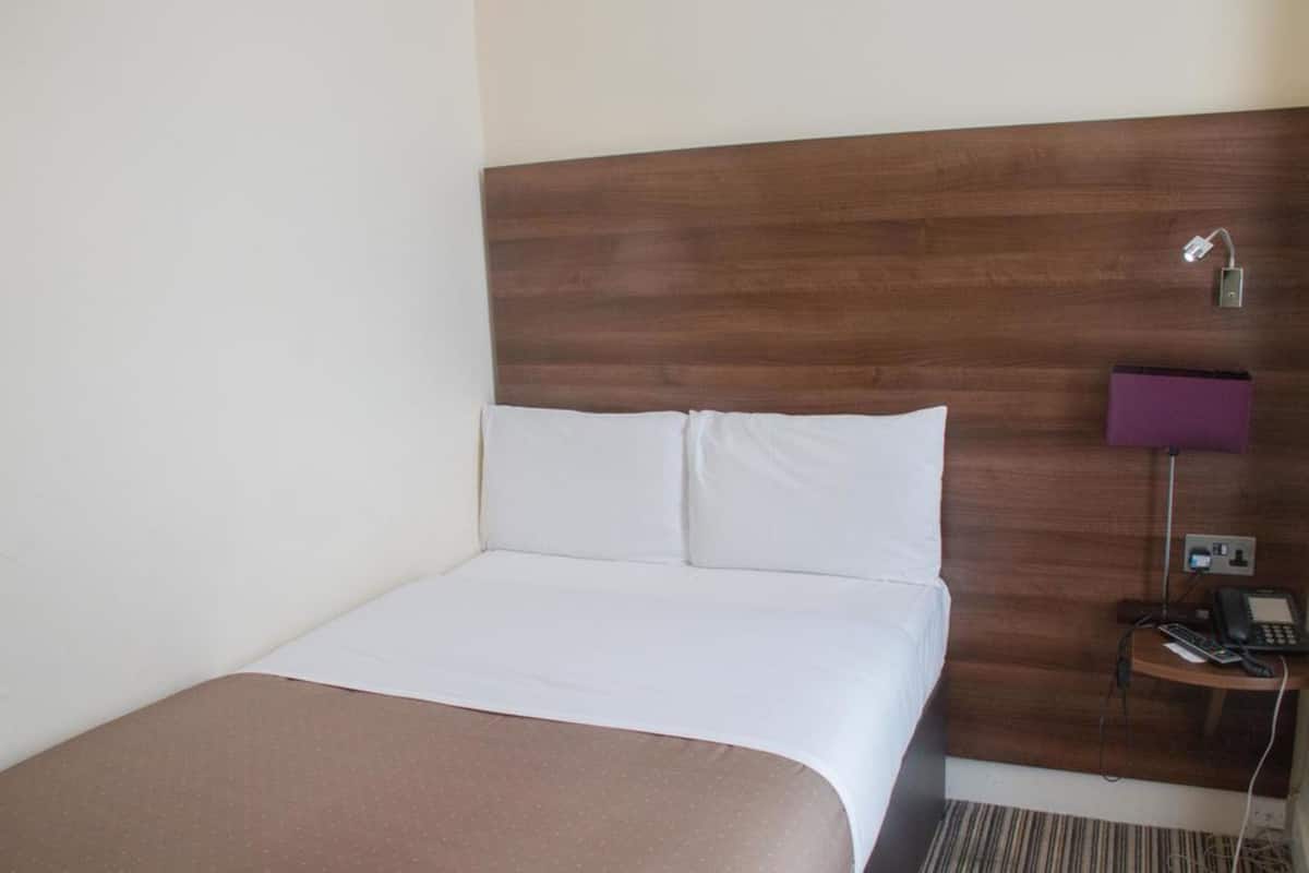 Desk, iron/ironing board, free wired Internet, bed sheets