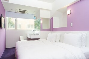 Standaard Twin kamer | Luxe beddengoed, donzen dekbedden, individueel gedecoreerd