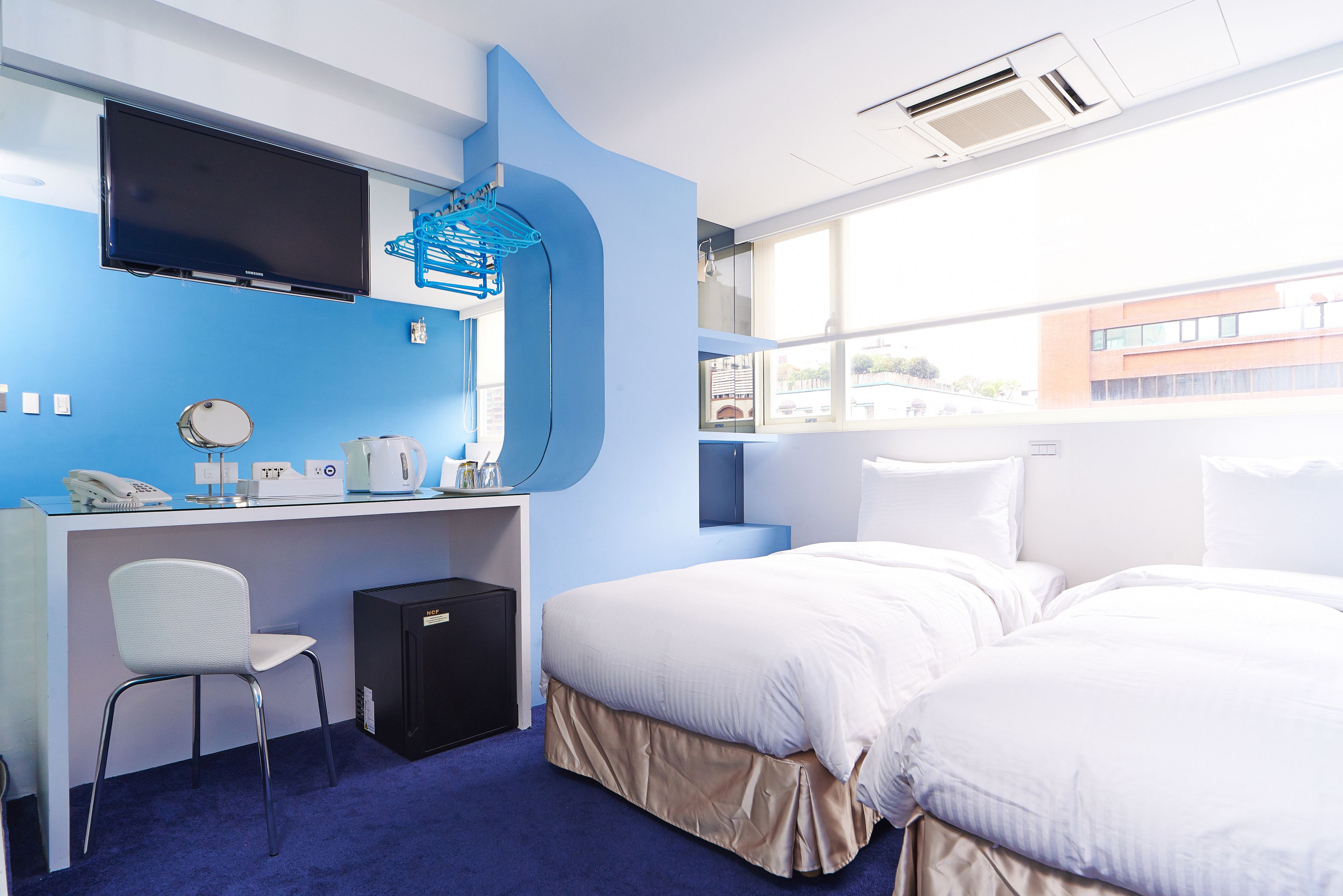 standard twin room | premium bedding, down duvets, individually decorated