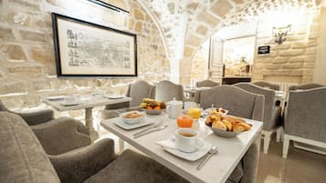 Daily buffet breakfast (EUR 18 per person)