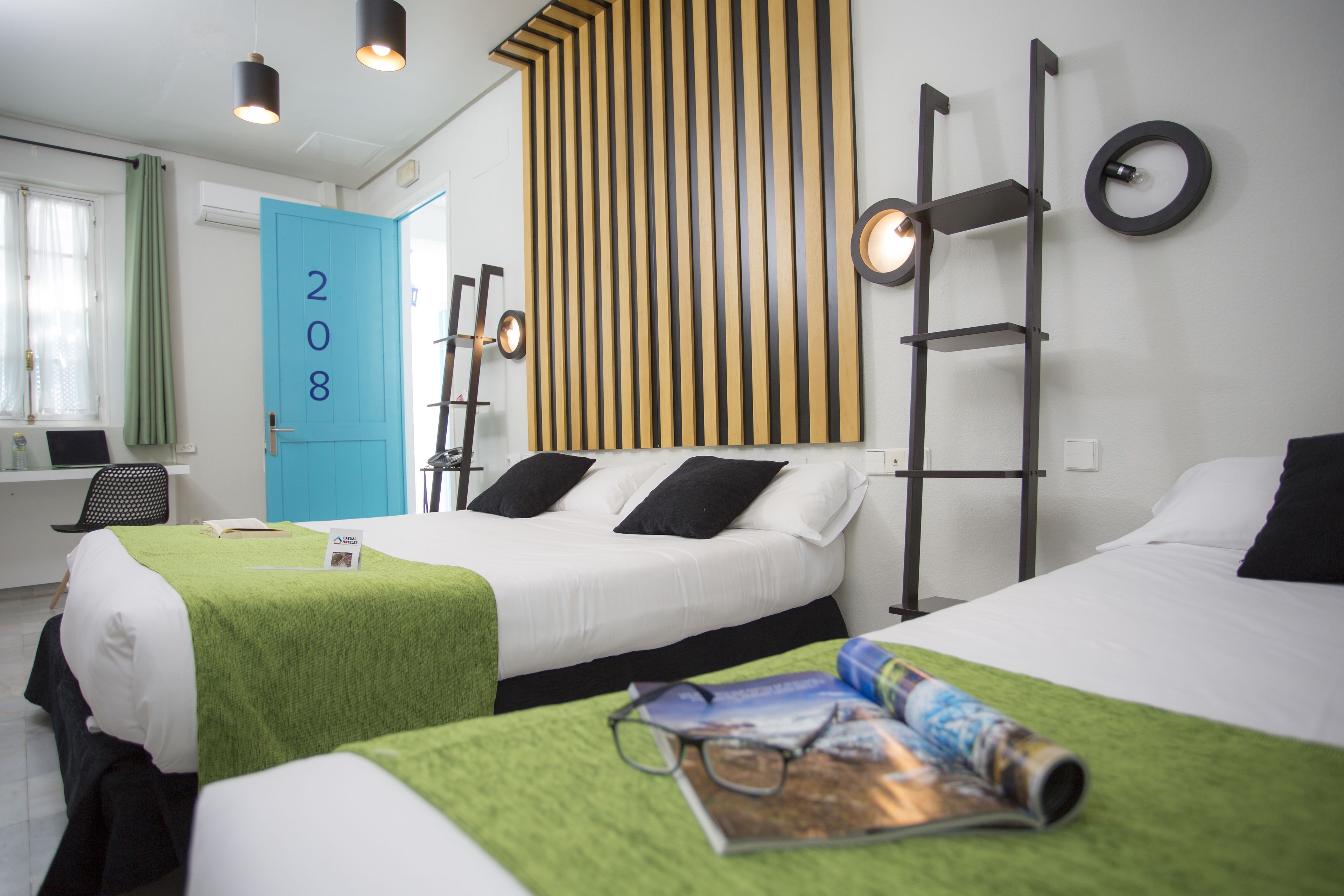 family triple room | minibar, in-room safe, desk, iron/ironing board