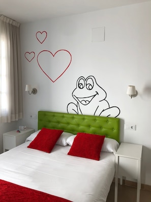Economy Room | Minibar, in-room safe, individually decorated, desk - Casual de las Letras Sevilla Hotel by Casual Hoteles (Seville)