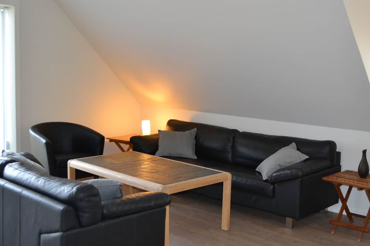 Deluxe-Apartment | Wohnbereich | Flachbildfernseher