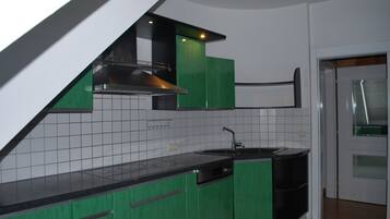 Penthouse, 2 Bedrooms, Jetted Tub | Private kitchen | Fridge, coffee/tea maker, cookware/dishes/utensils, dining tables