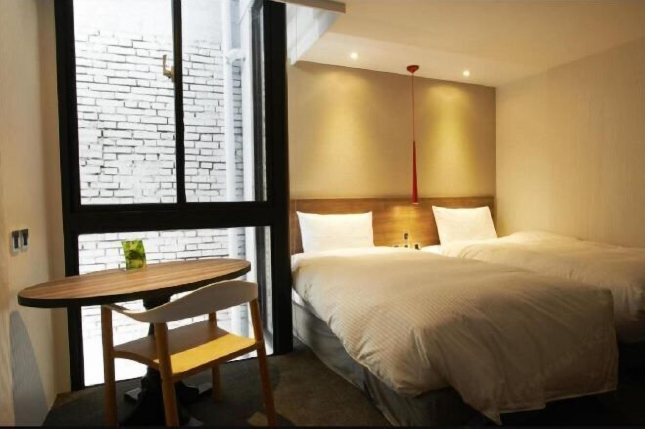 Edredón, camas con pillow-top y caja de seguridad en la habitación 