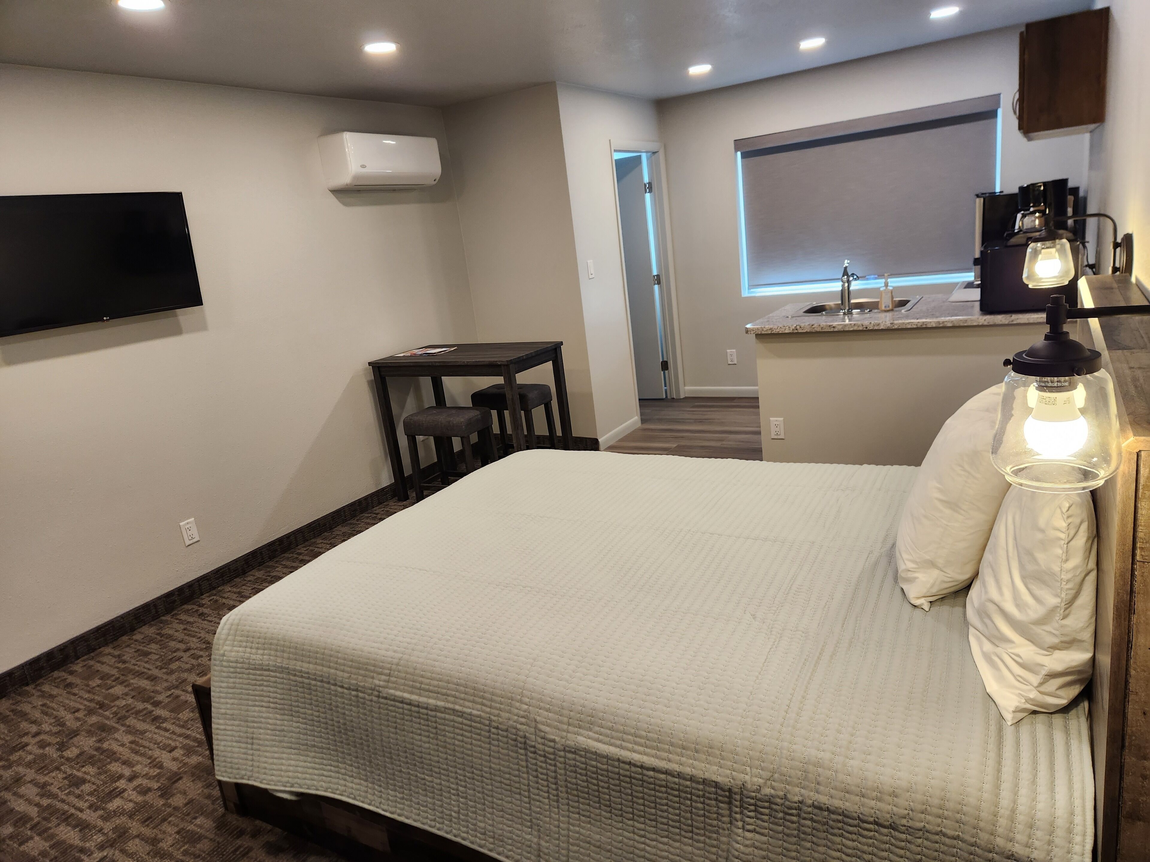 Studio, 1 Queen Bed, No Pets Allowed | Desk, laptop workspace, blackout drapes, iron/ironing board