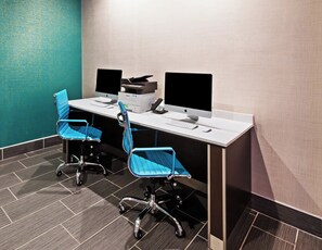 A modern office space with two desks, two chairs, and two monitors. - Holiday Inn Express & Suites Killeen - Fort Hood Area by IHG (Killeen)