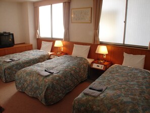Chambre triple, fumeur | Accès au Wi-Fi (inclus)