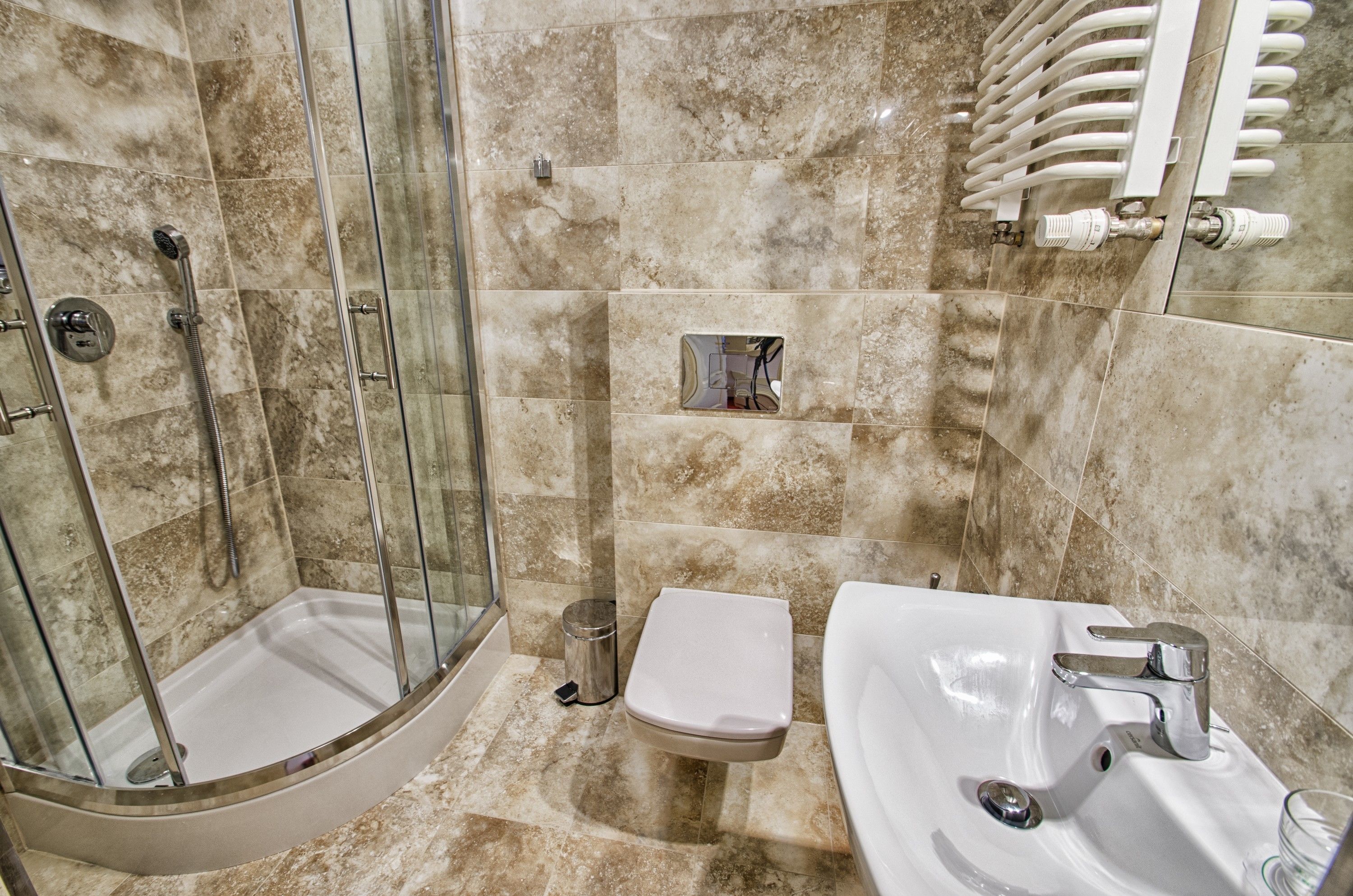 deep-soaking bathtub, hair dryer, towels