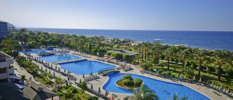 Indoor pool, seasonal outdoor pool, pool umbrellas, sun loungers