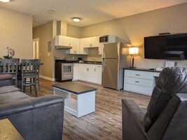 Suite, Kitchen (Pet Friendly) | Living area | Flat-screen TV