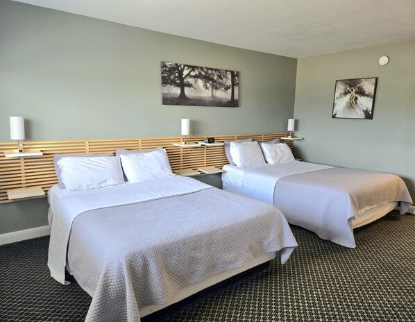 Double Room, 2 Queen Beds | Iron/ironing board, free cribs/infant beds, free WiFi, bed sheets