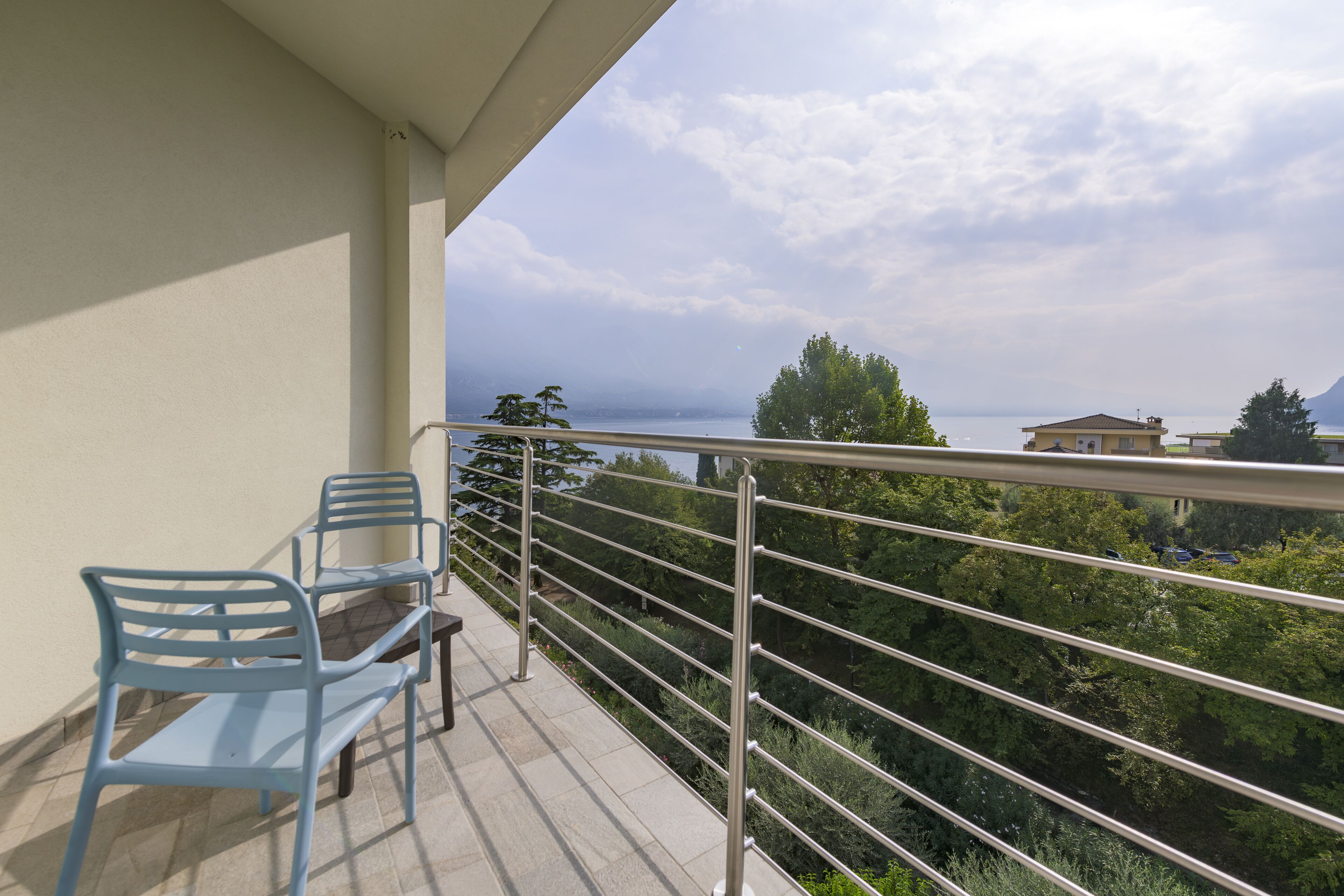 comfort room, balcony, partial lake view | balcony