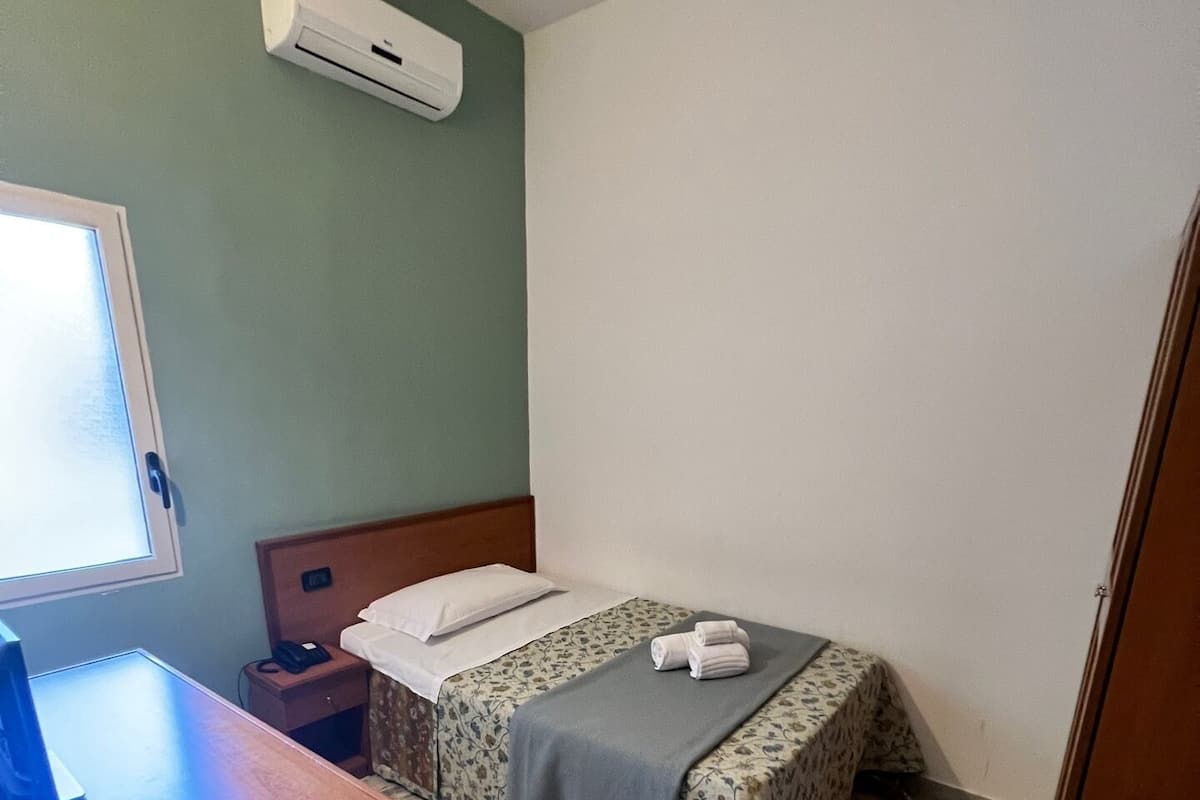 Basic Single Room | Individually furnished, desk, free WiFi, bed sheets