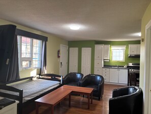 Cottage, 2 Bedrooms | Living area | 32-inch LCD TV with cable channels, TV