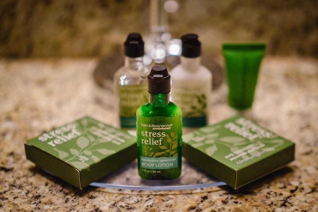 combined shower/bathtub, designer toiletries, hair dryer, towels