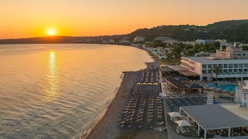 On the beach, beach towels, beach volleyball