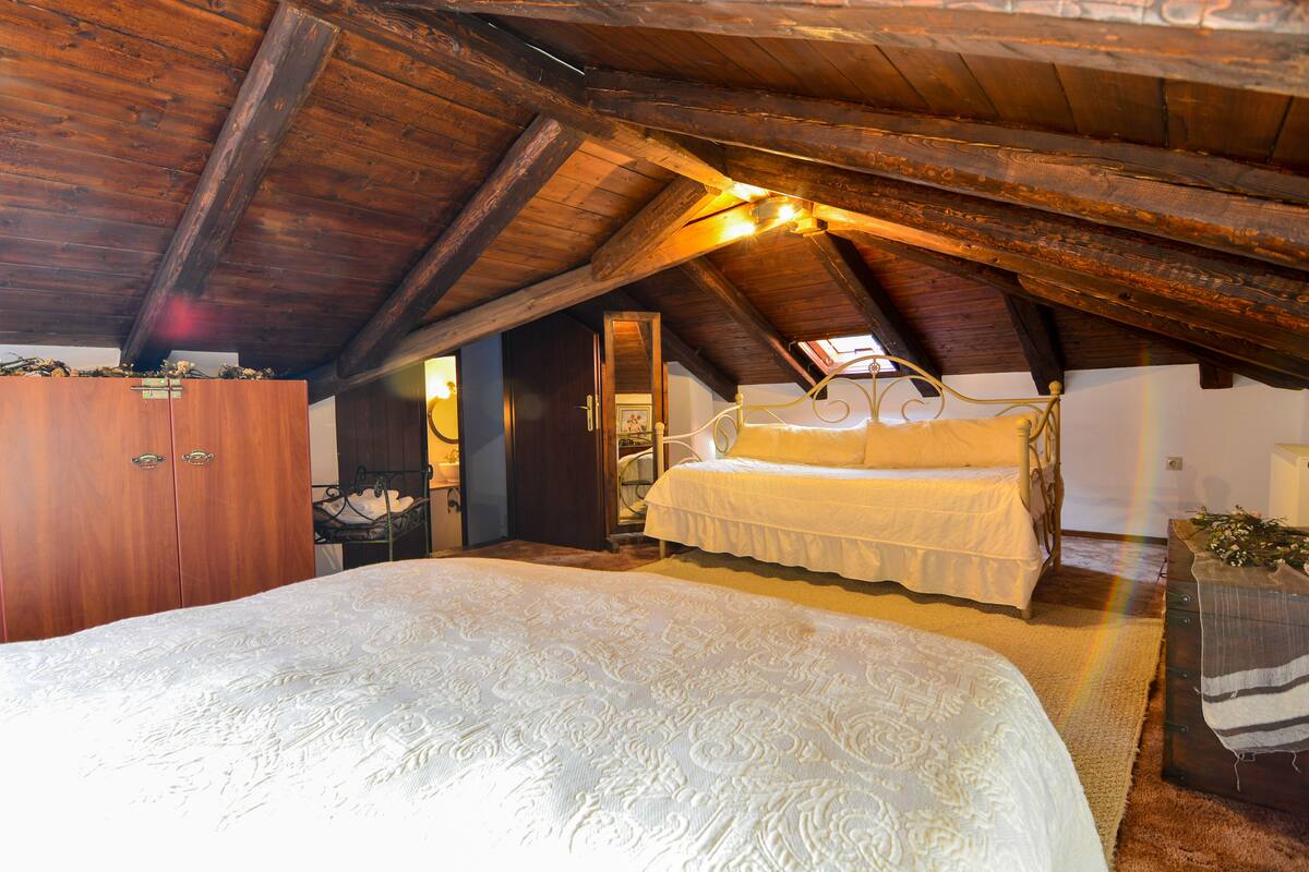 family room, fireplace | frette italian sheets, premium bedding, down duvets, bed sheets