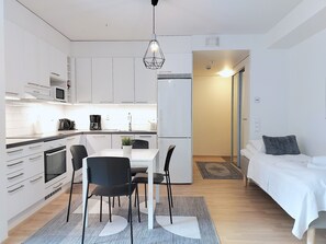 Apartment, 1 Bedroom (City Center Area) | Private kitchen | Microwave, oven, stovetop, coffee/tea maker - Kotimaailma Apartments Tampere (Tampere)