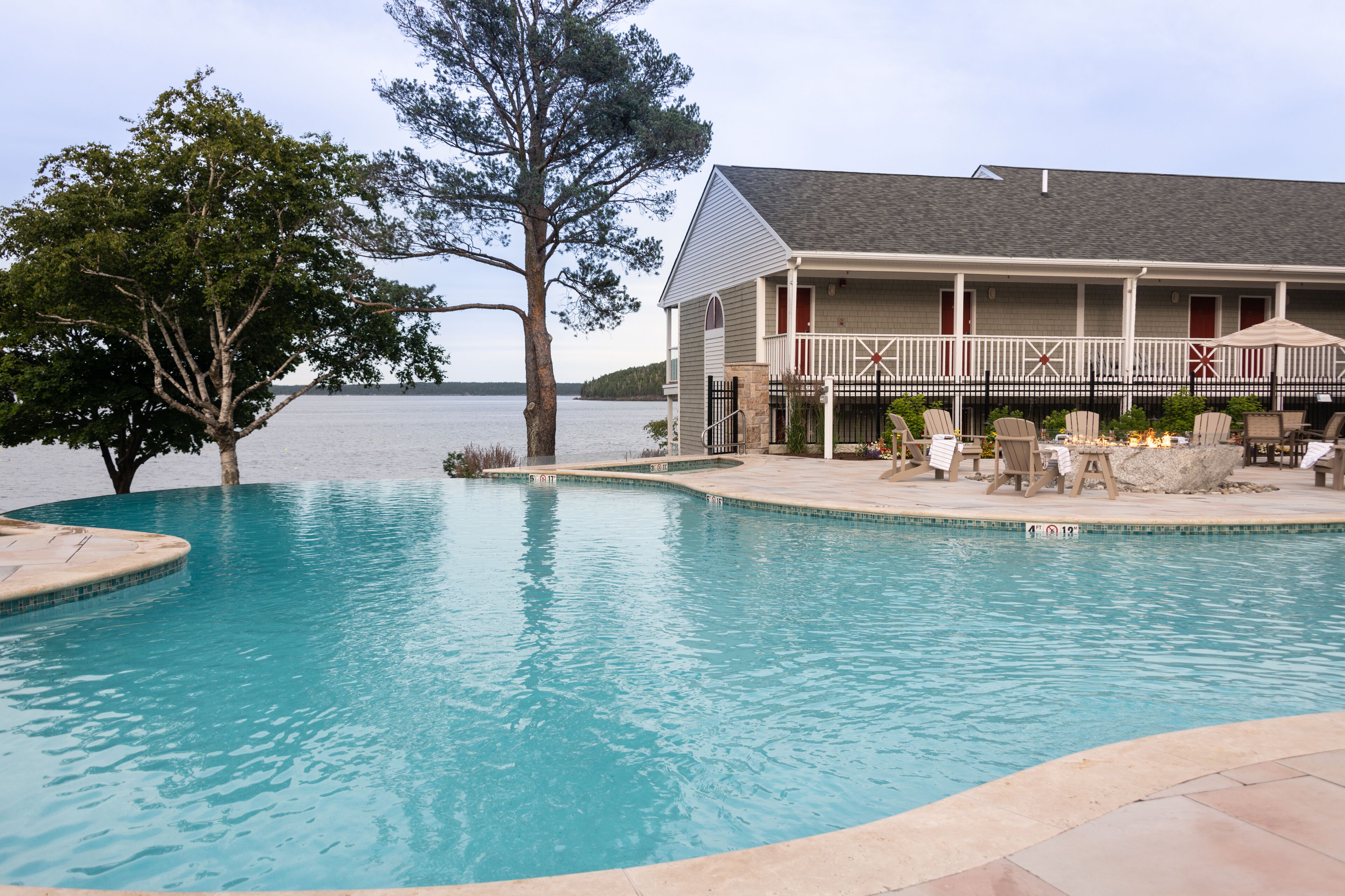 seasonal outdoor pool, pool umbrellas, pool loungers