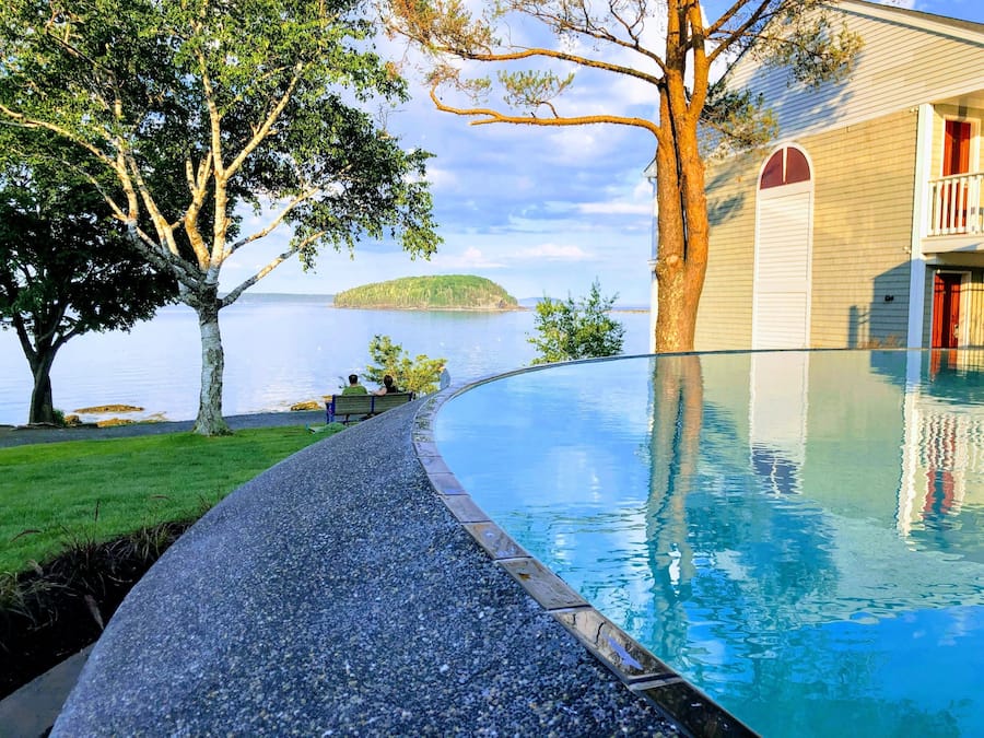 Seasonal outdoor pool, pool umbrellas, pool loungers