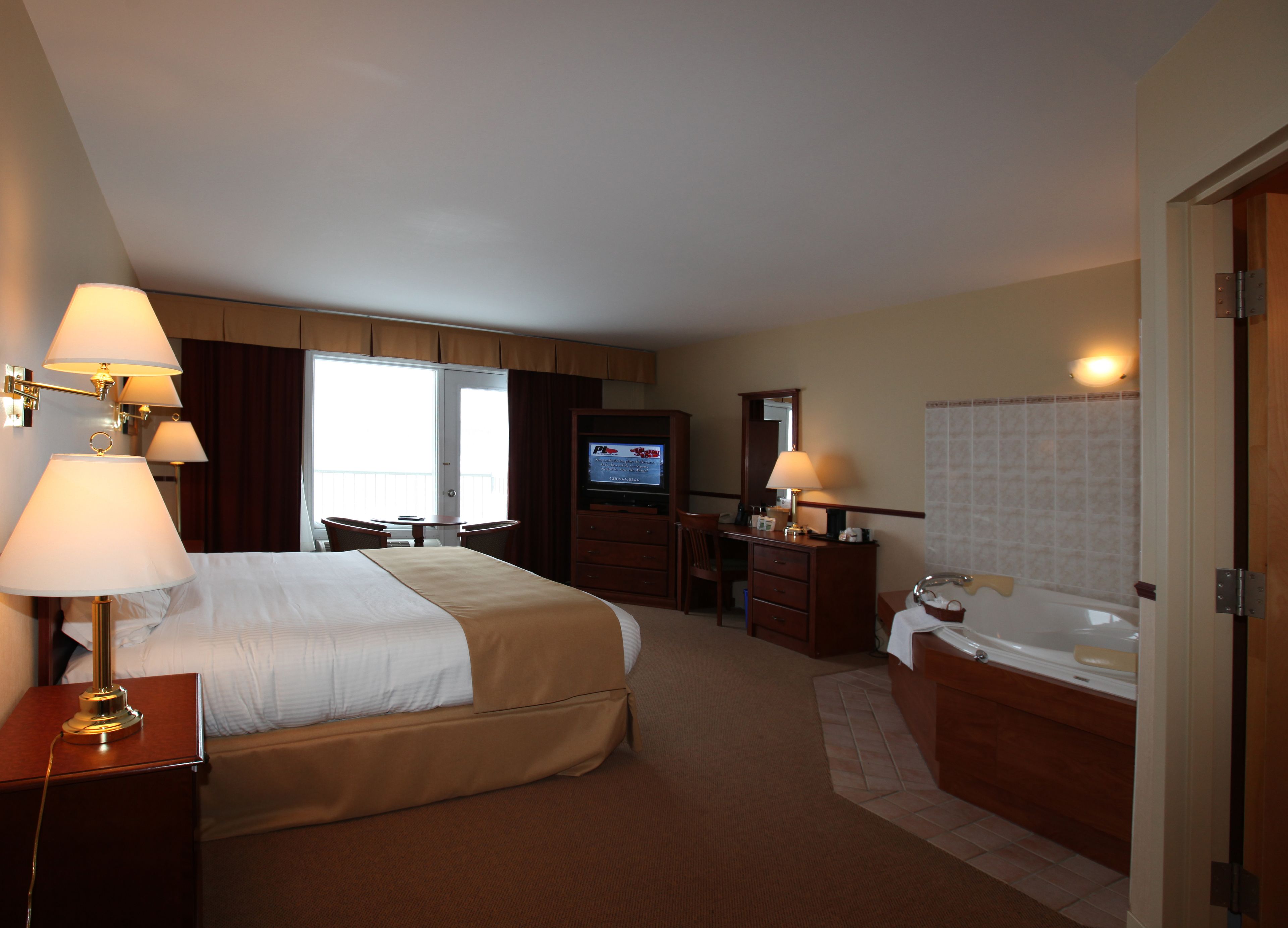 signature suite, 1 king bed, bay view | 1 bedroom, desk, blackout curtains, iron/ironing board