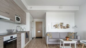 Departamento, 1 habitación | Área de sala de estar