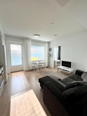 Apartment, 1 Bedroom | Living area | Flat-screen TV - Kotimaailma Apartments Oulu (Oulu)