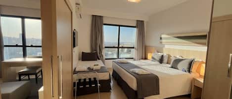 Suíte Super Luxo Triplo | 1 camera, biancheria da letto di alta qualità, minibar