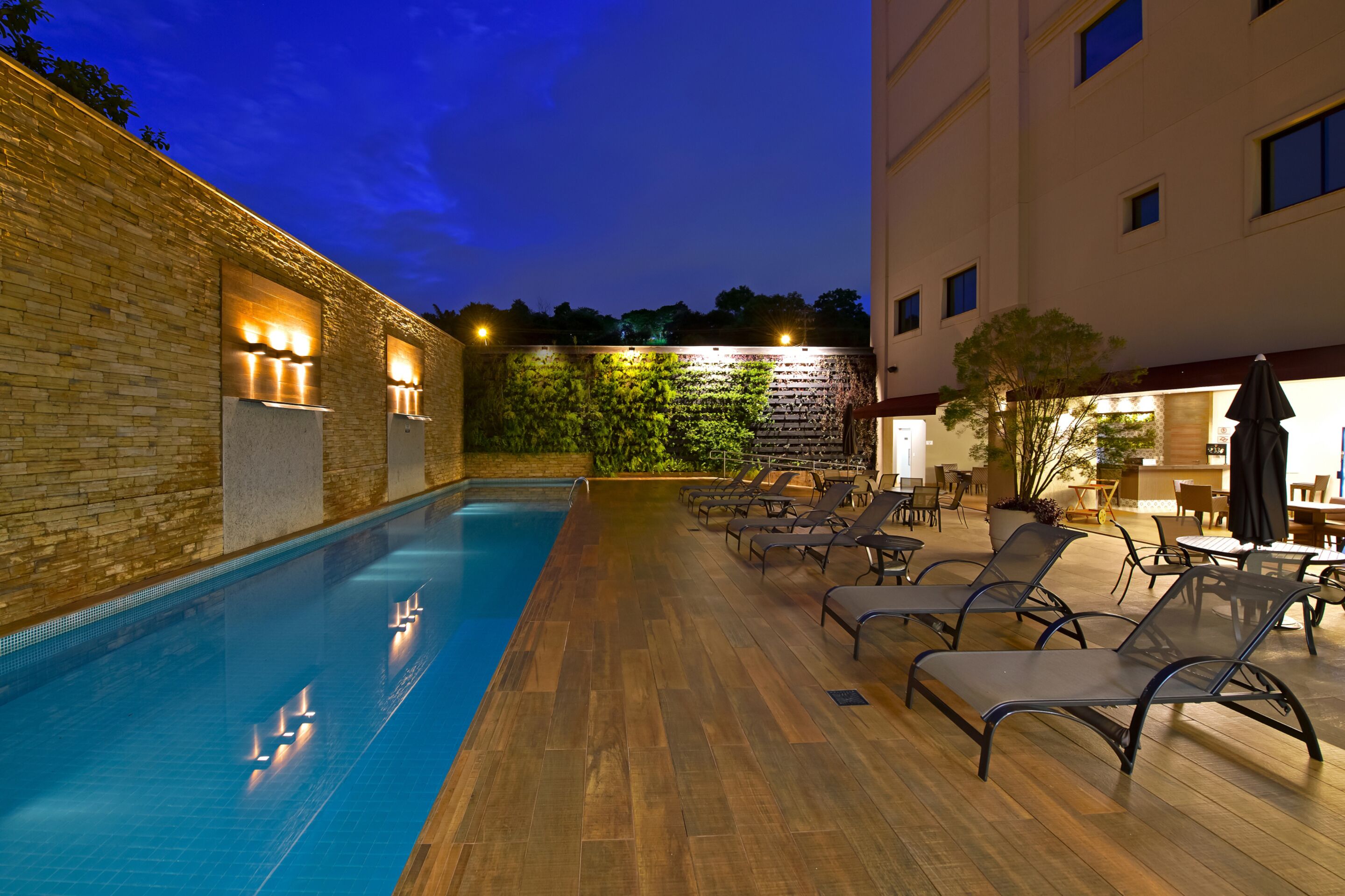 outdoor pool, open 6:00 am to 6:30 pm, pool umbrellas, pool loungers