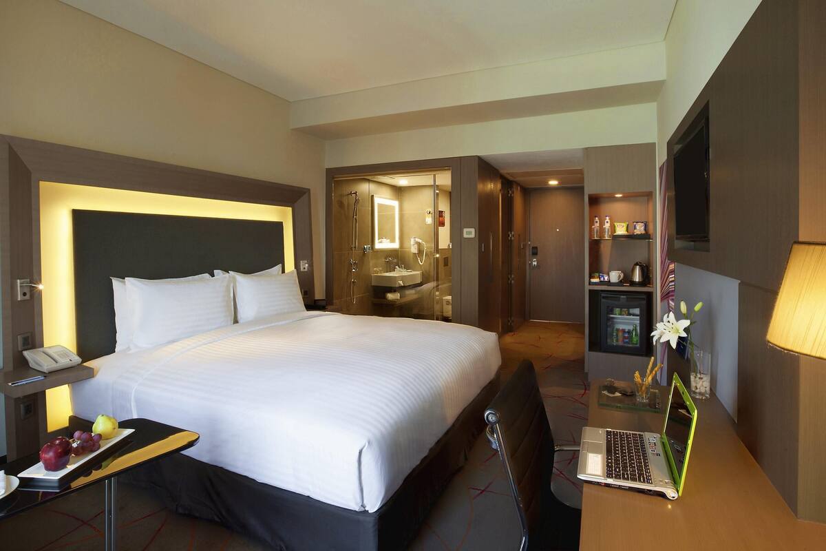 Premium bedding, down duvets, in-room safe, desk