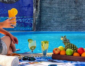 Outdoor pool, open 7 AM to 8 PM, pool umbrellas, sun loungers