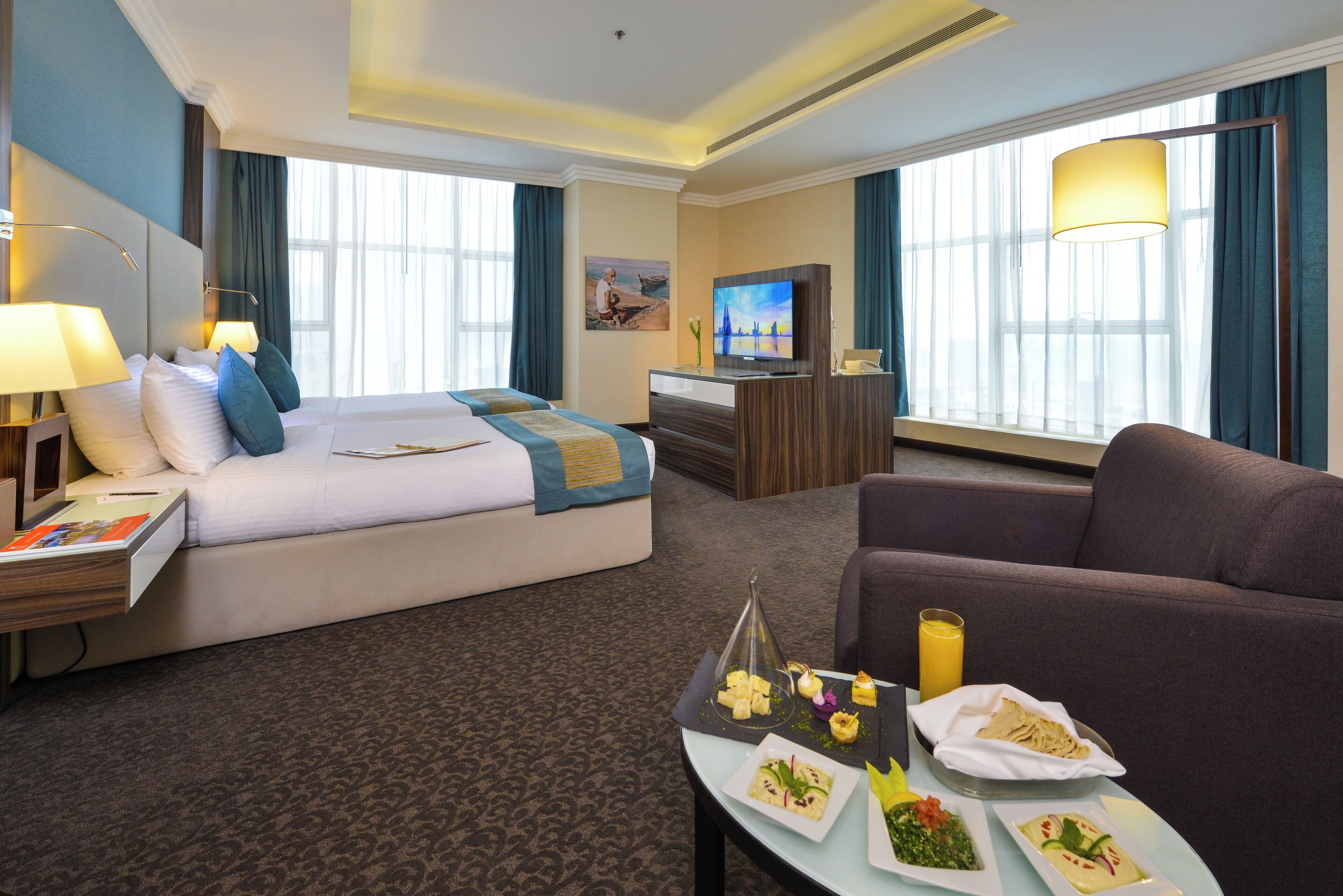 Minibar con snack e bevande gratuite, cassaforte in camera