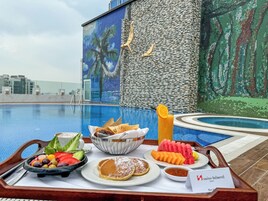 Outdoor pool, open 7 AM to 8 PM, pool umbrellas, sun loungers