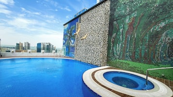 Outdoor pool, open 7 AM to 8 PM, pool umbrellas, sun loungers