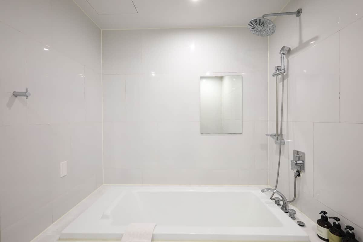 Premium Twin Styler (5 Free OTTs Available) | Bathroom | Separate tub and shower, deep soaking tub, hair dryer, bathrobes